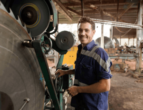 Smiling workshop worker - business vehicle finance for tradies and contractors