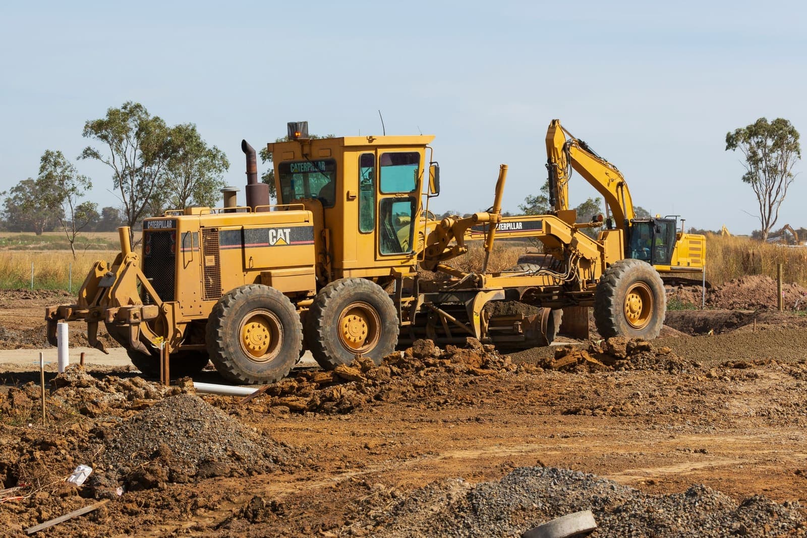 CAT bulldozer and excavator on an Australian construction site in Victoria - plant and machinery finance
